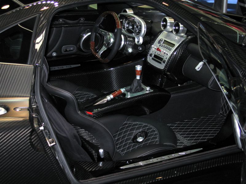 Carbon fiber interior with leather diamond-stitched seats and sporty cockpit design