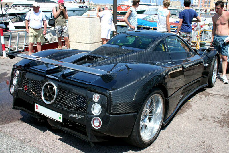 Carbon fiber rear with aerodynamic spoiler and signature tail lights.