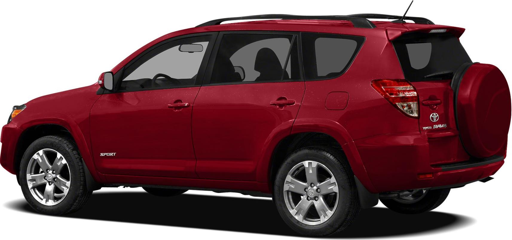 Side profile of a red SUV with rear spare wheel and roof rails.