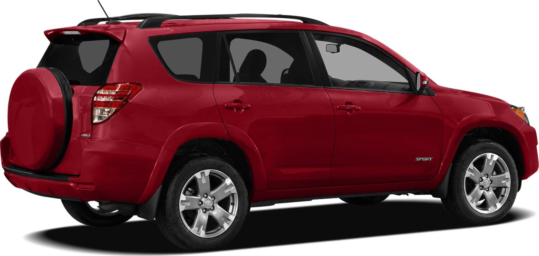Rear side view of a red SUV with spare tire on tailgate and alloy wheels
