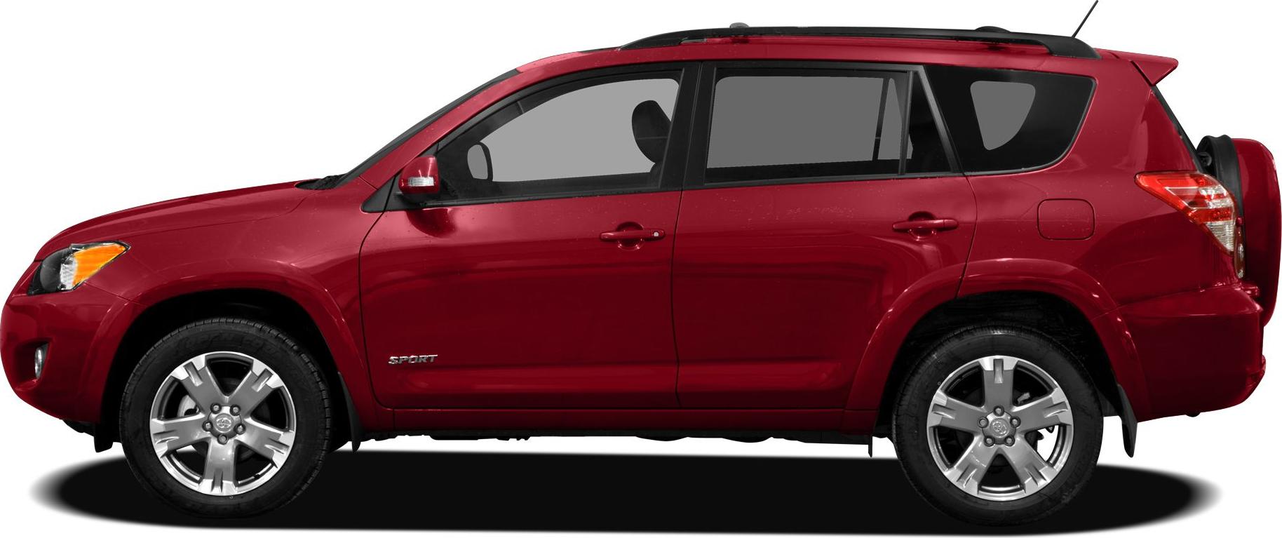 Side view of red SUV with alloy wheels and roof rails