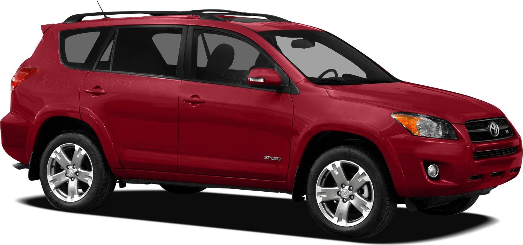 Side view of red compact SUV with roof rails and alloy wheels