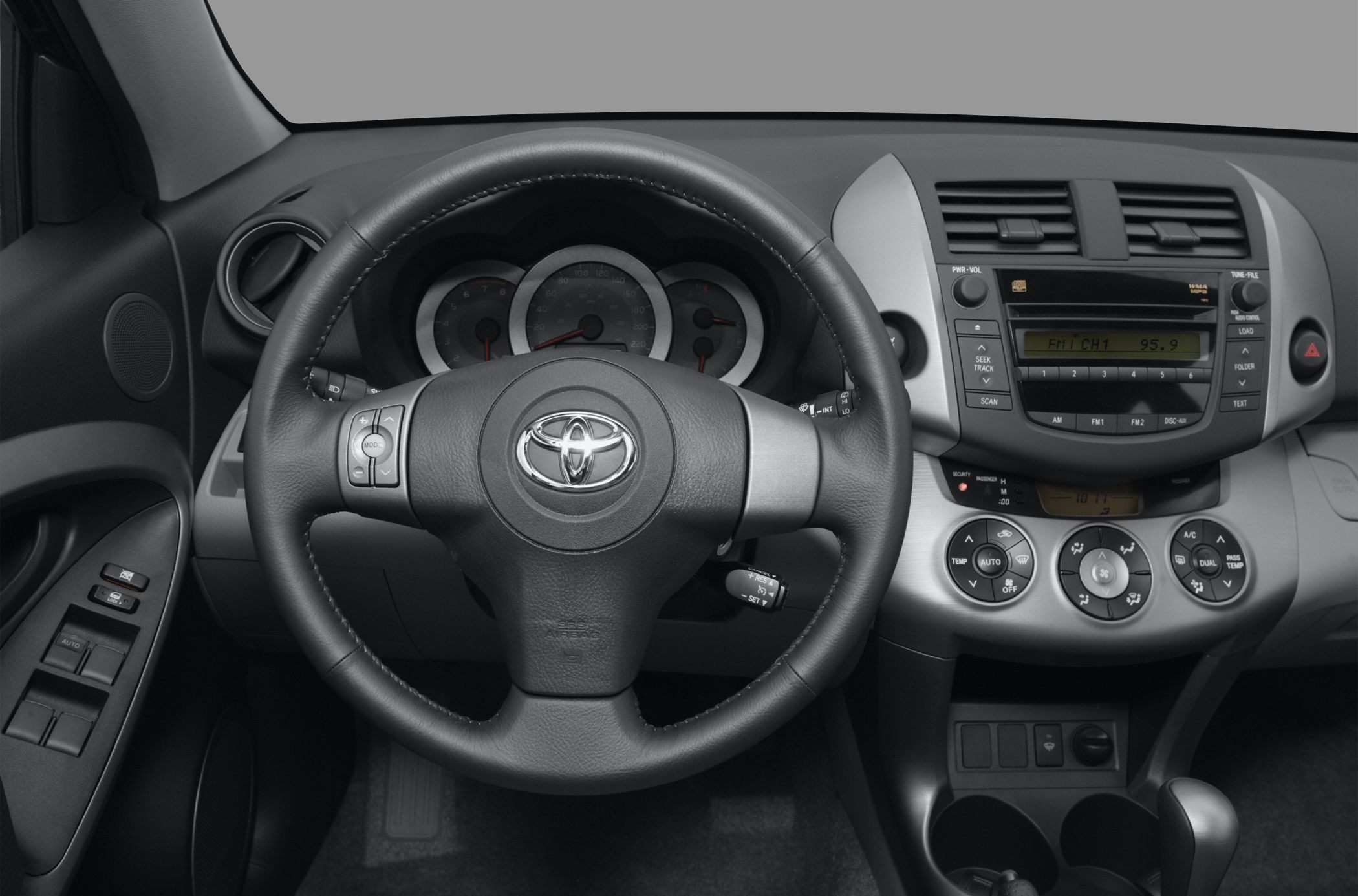 Dashboard and steering wheel with instrument cluster and controls