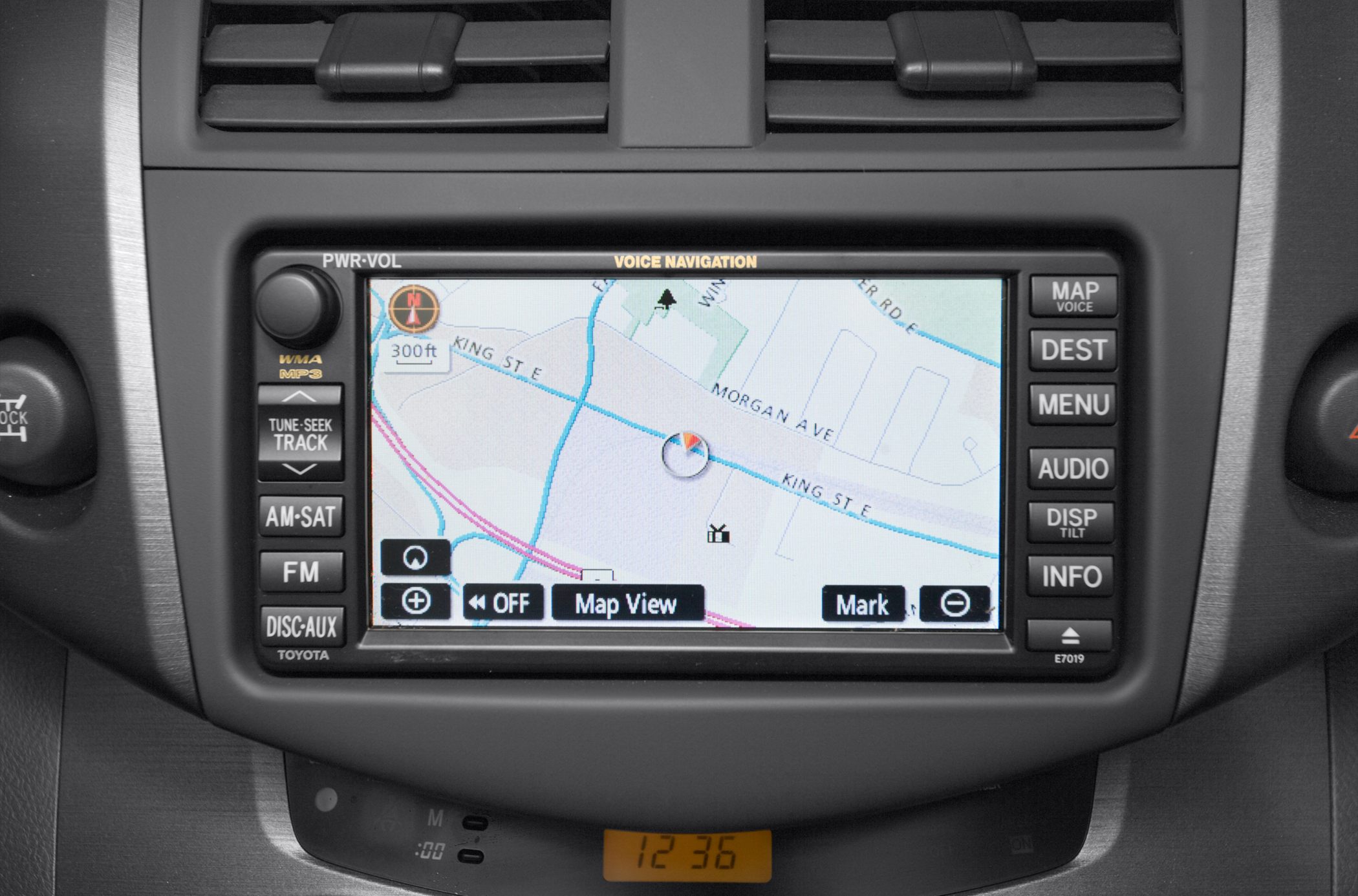 In-dash navigation system with voice commands and map controls