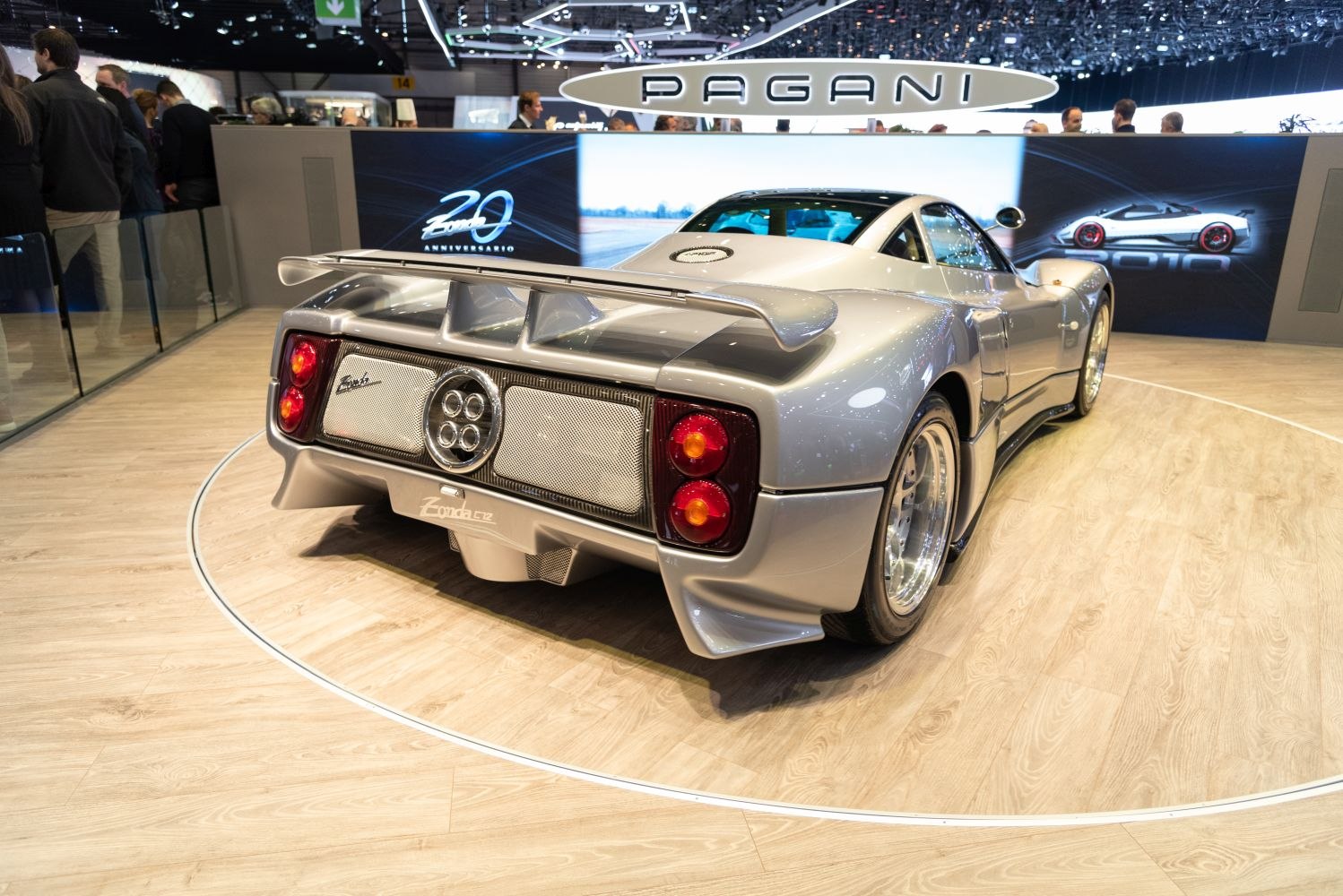Sleek rear view with round taillights and large aerodynamic spoiler