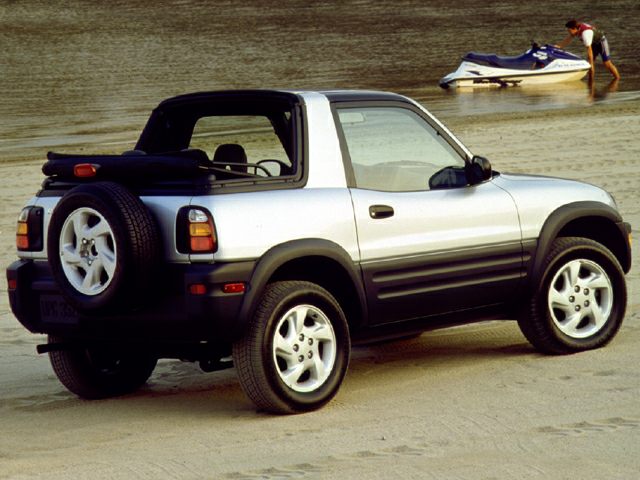 Compact SUV with convertible soft top roof and side profile