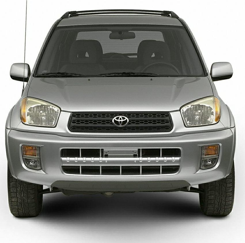 Front view with headlights, grille, and bumper of a mid-90s compact SUV
