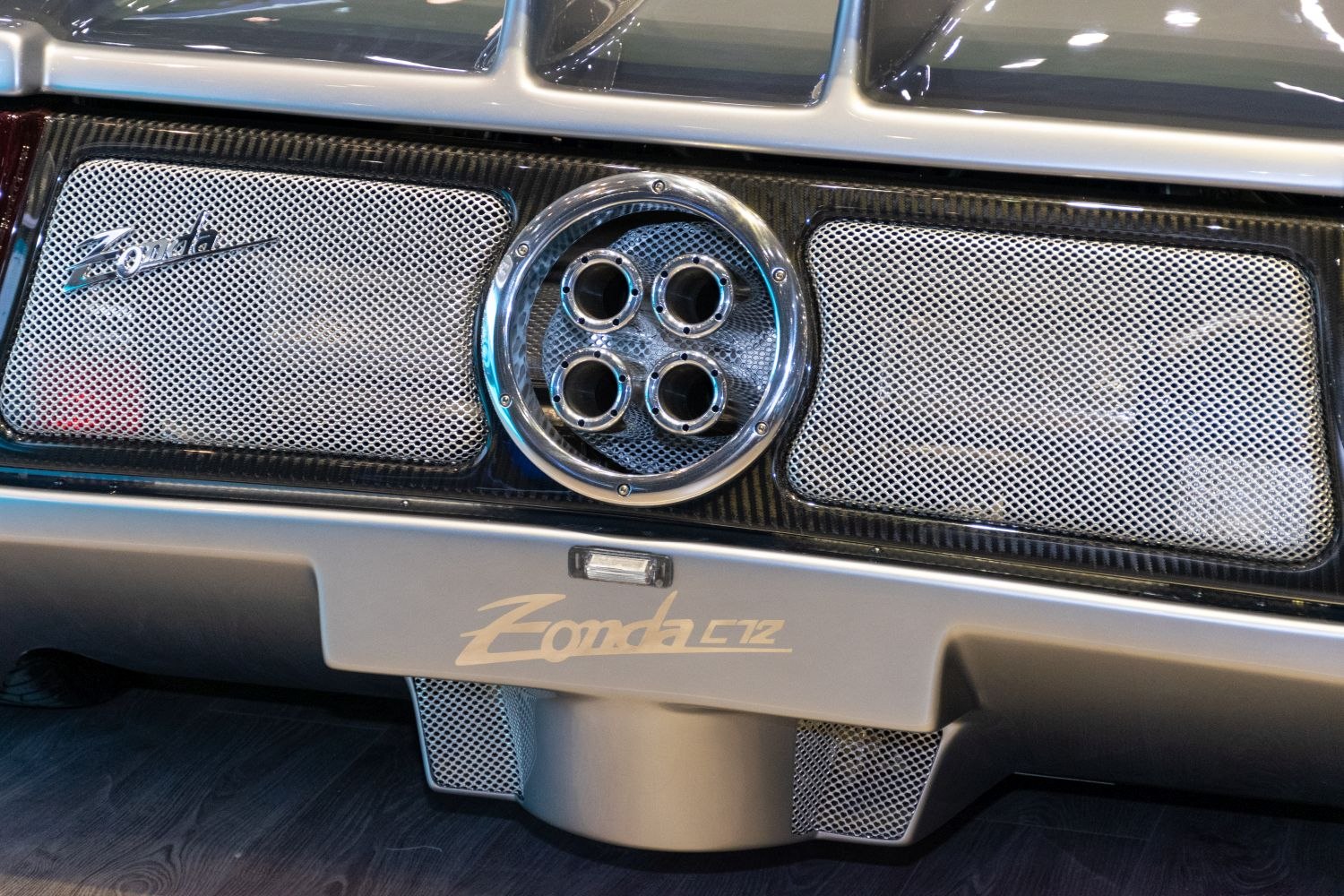 Close-up of quad exhaust and mesh rear grille.
