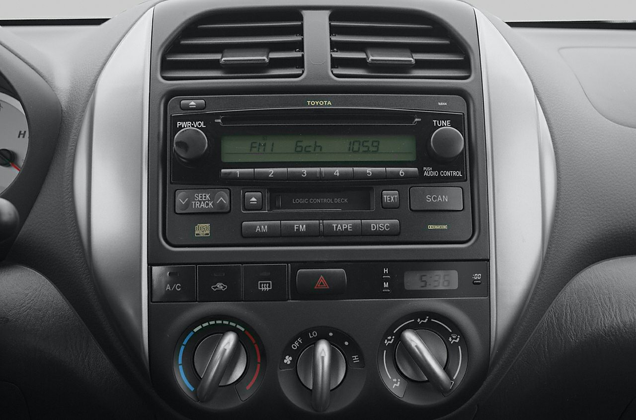 Vintage Toyota RAV4 dashboard with stereo and climate control knobs