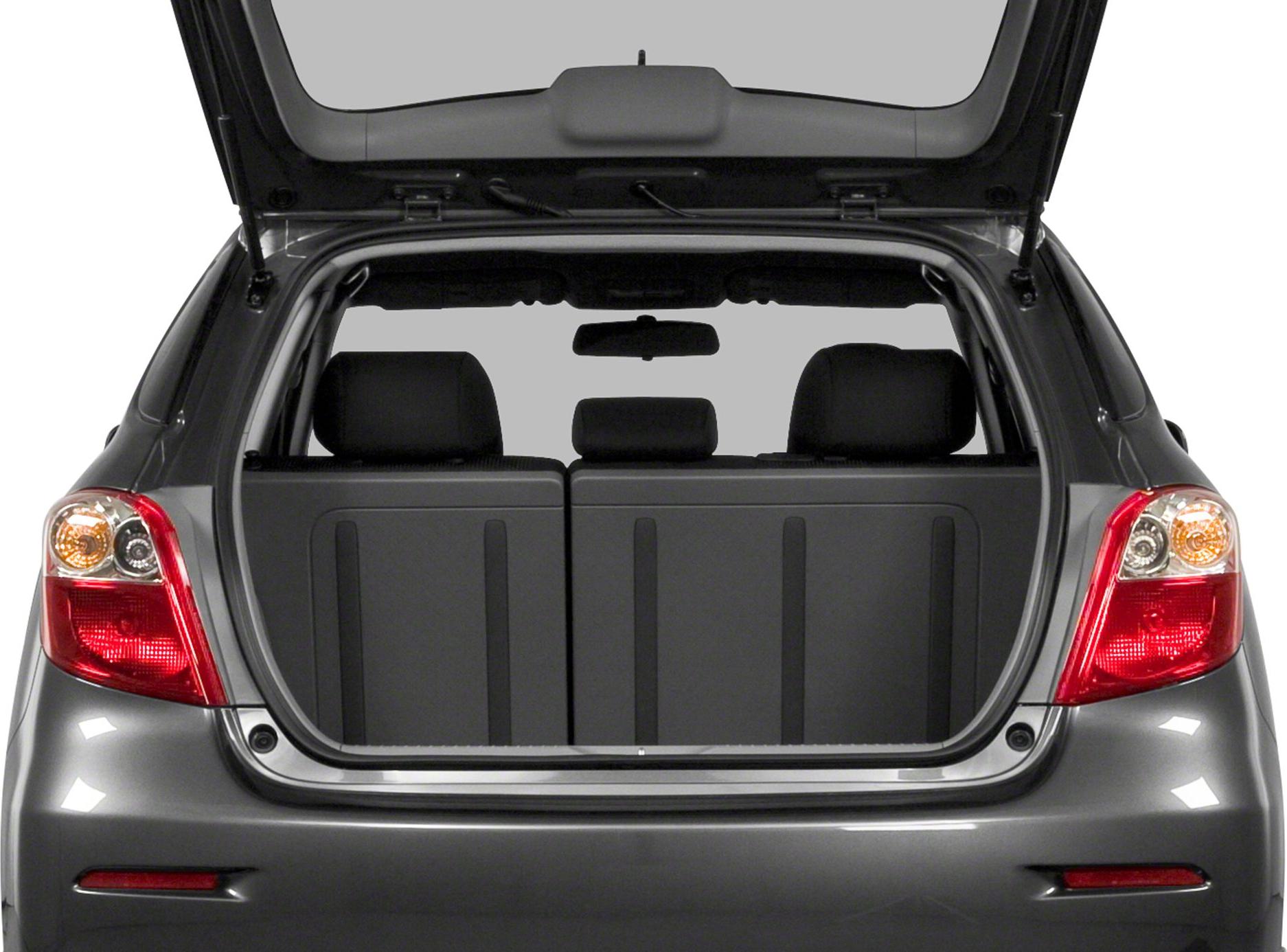 Open hatchback with visible rear cargo area and split rear seats.
