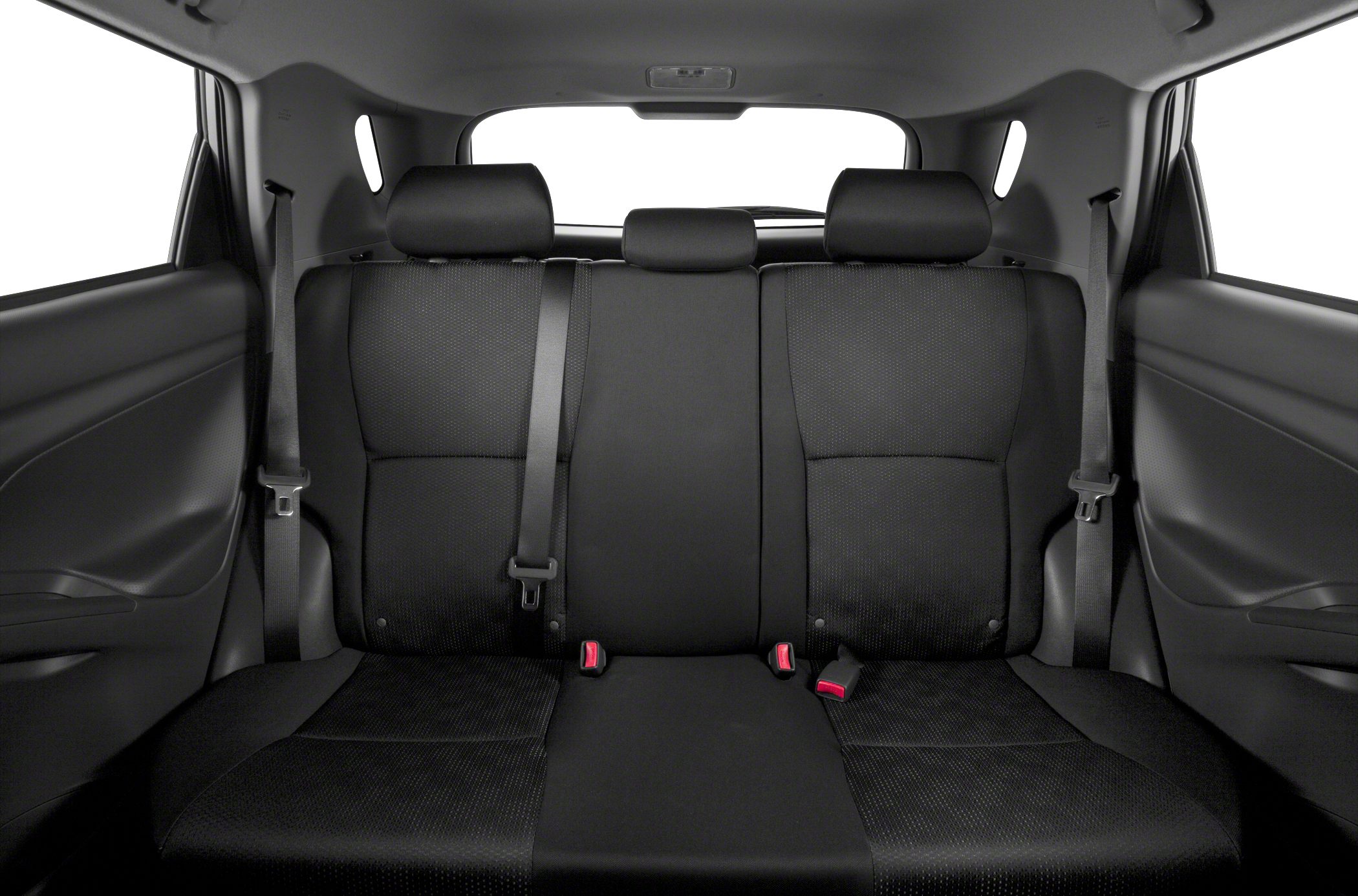 Rear seat with three headrests and seatbelts