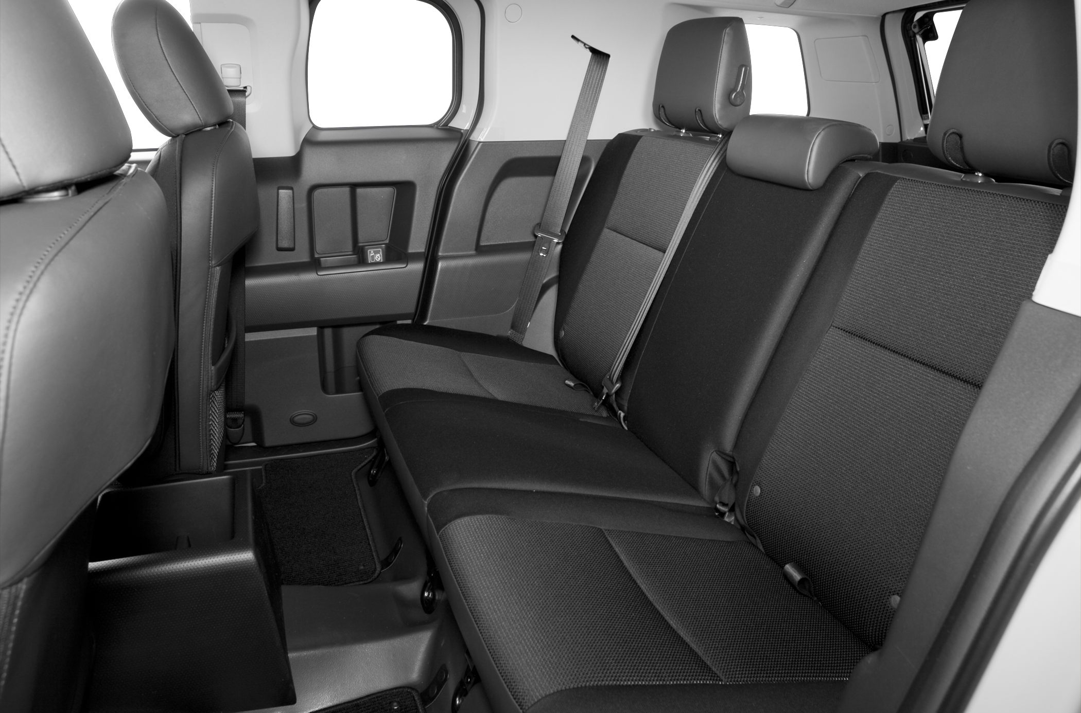 Rear seat seating area with seatbelt and headrests