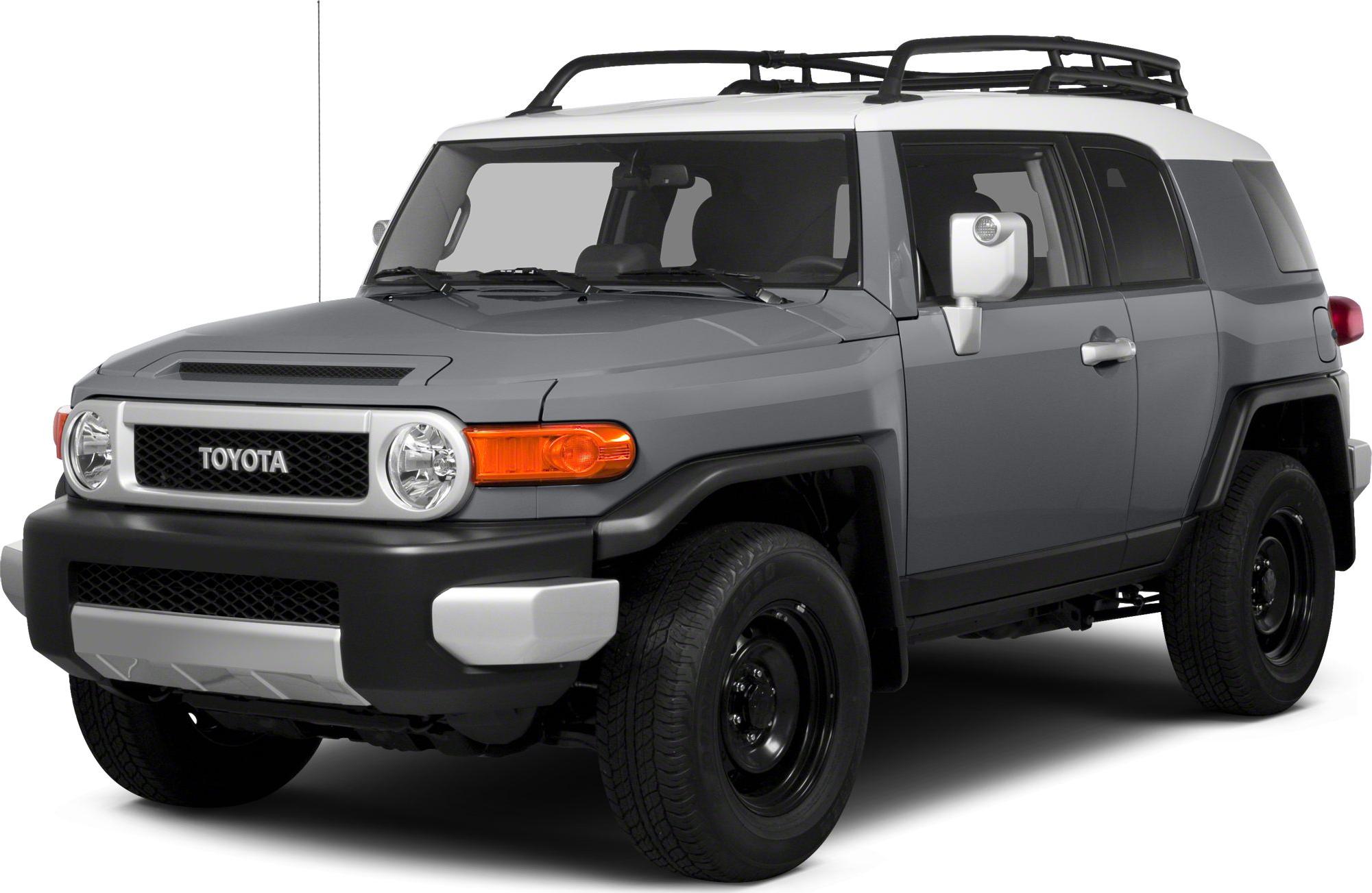 Front view of rugged SUV with roof rack and round headlights