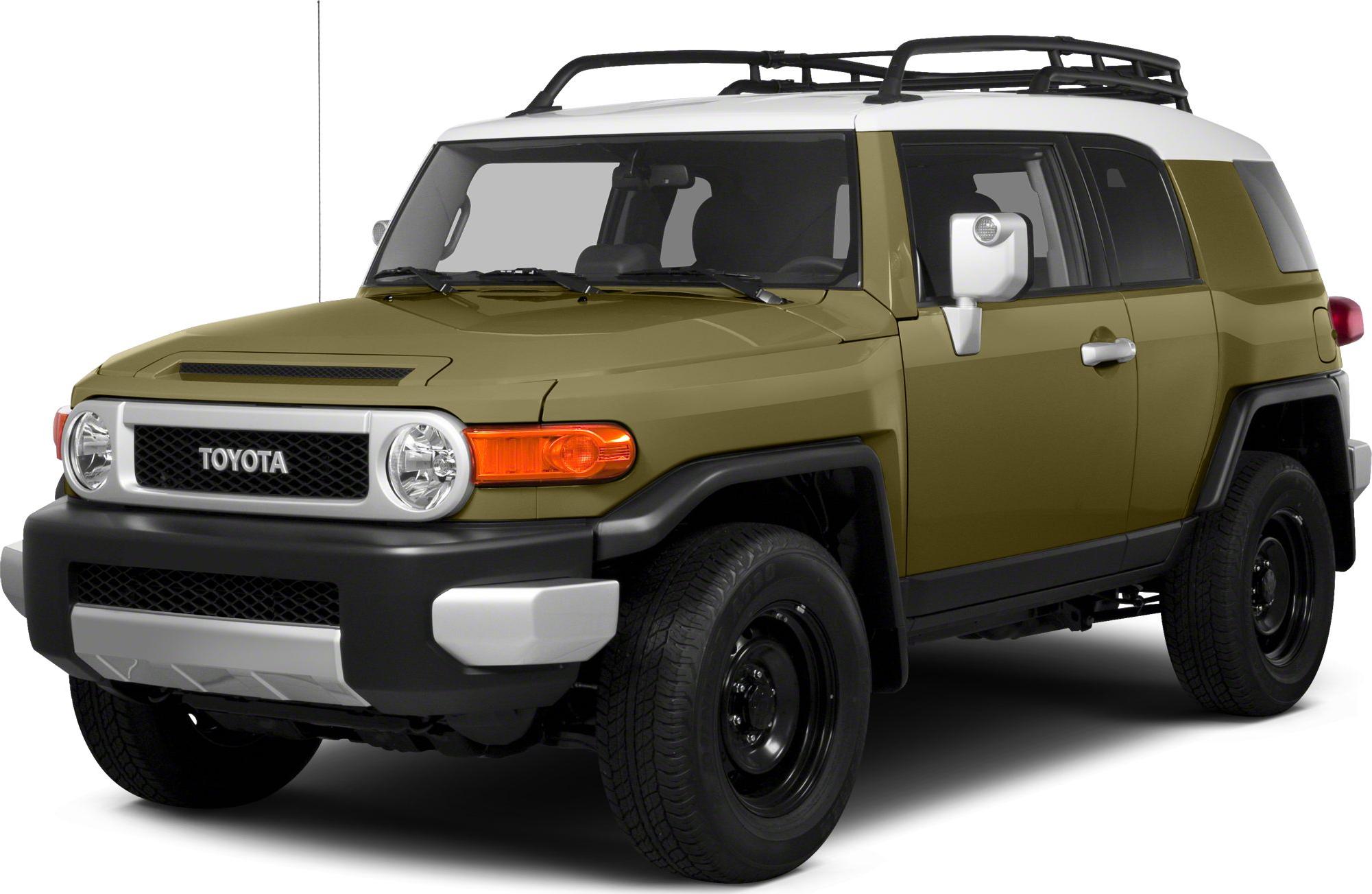 Front angled view with round headlights and roof rack