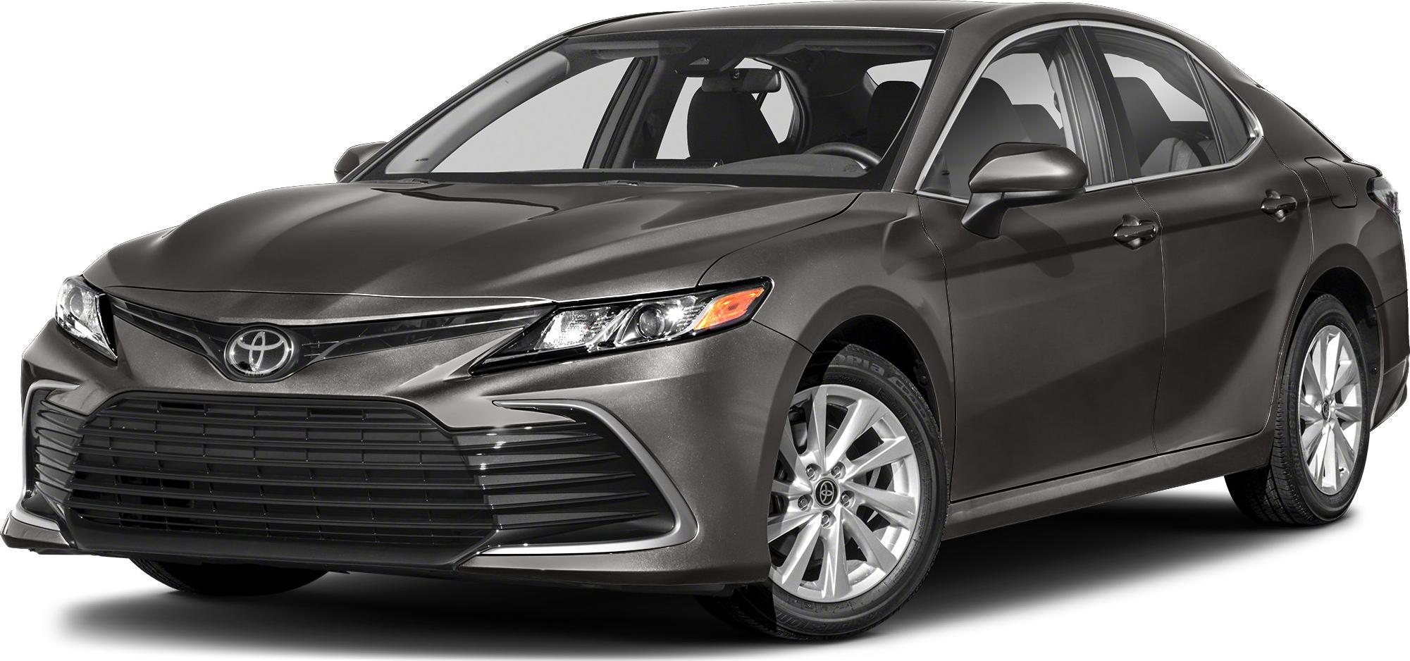 Front angled view of modern sedan with sharp headlights and large black grille
