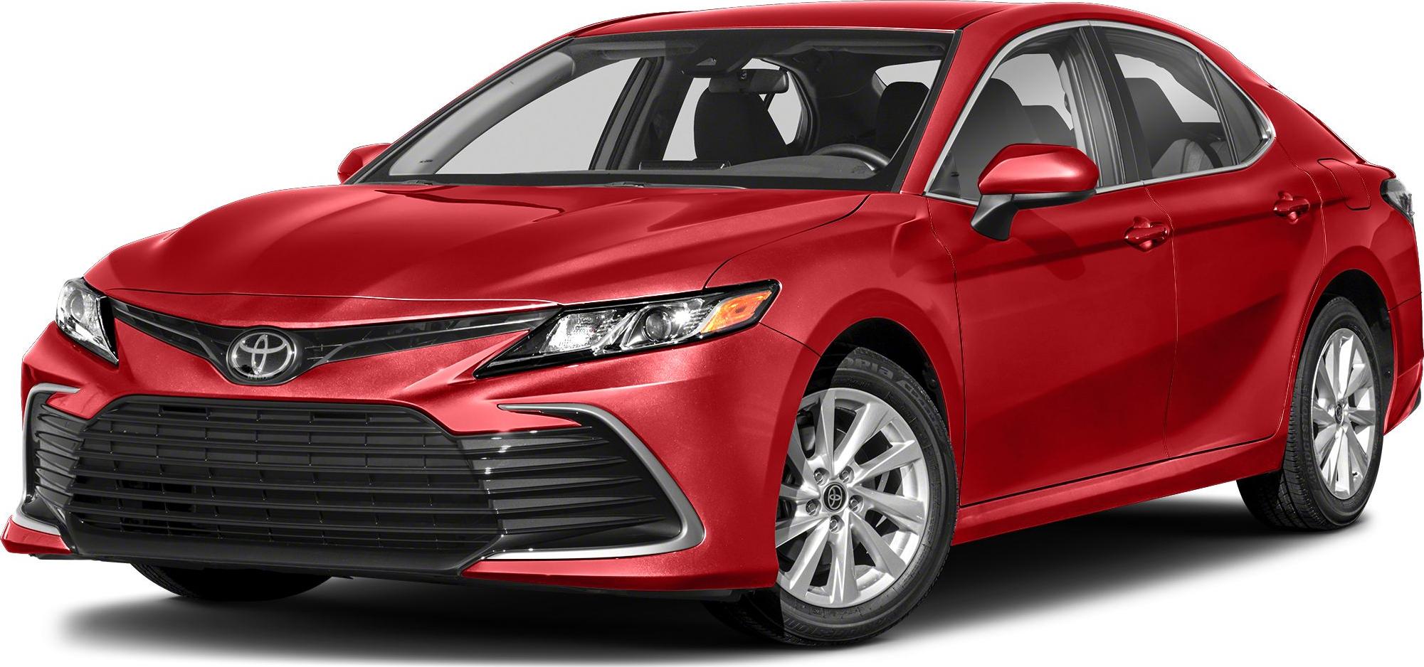 Front-left view of mid-size sedan with aggressive grille and aerodynamic body