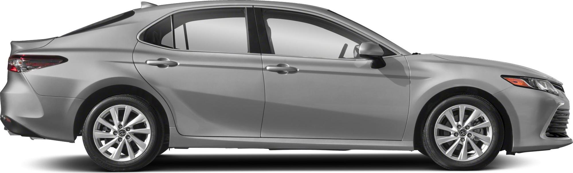 Side profile of sleek sedan with alloy wheels and LED headlights