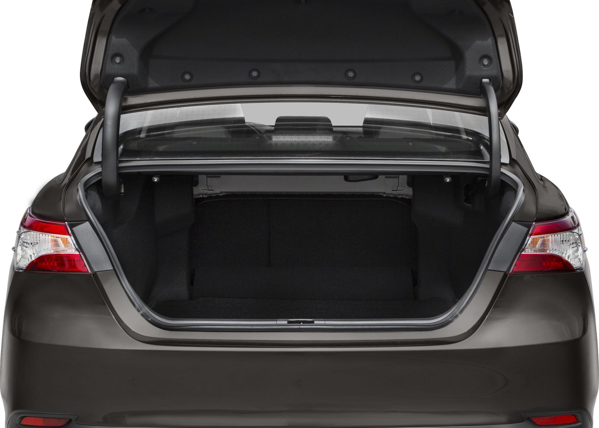 Open and spacious car trunk viewed from rear with visible tail lights