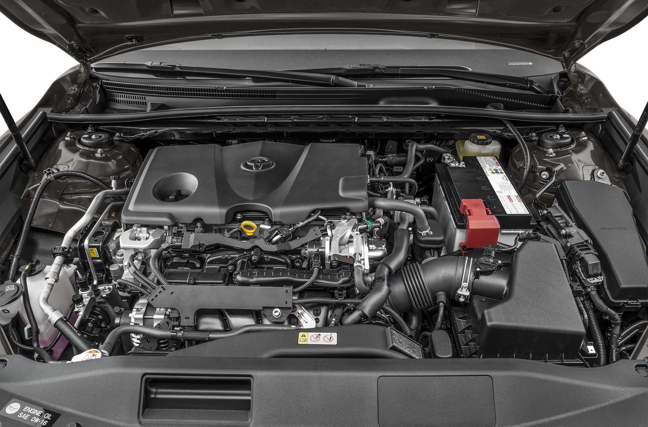 Modern engine compartment with visible engine cover and battery