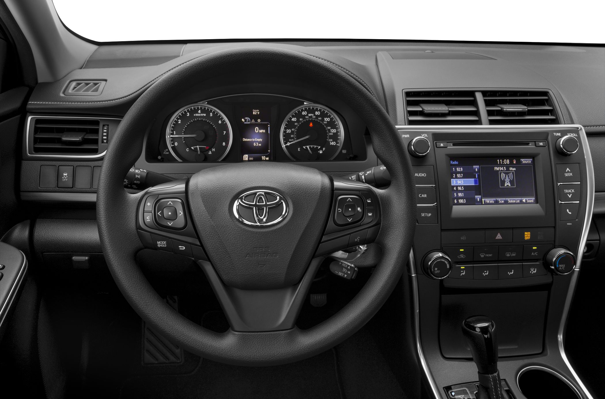 Dashboard with steering wheel, instrument cluster, infotainment display