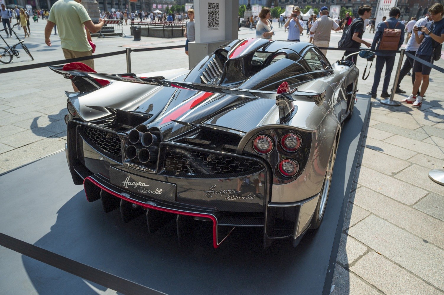 Rear view with quad exhaust and carbon fiber wing