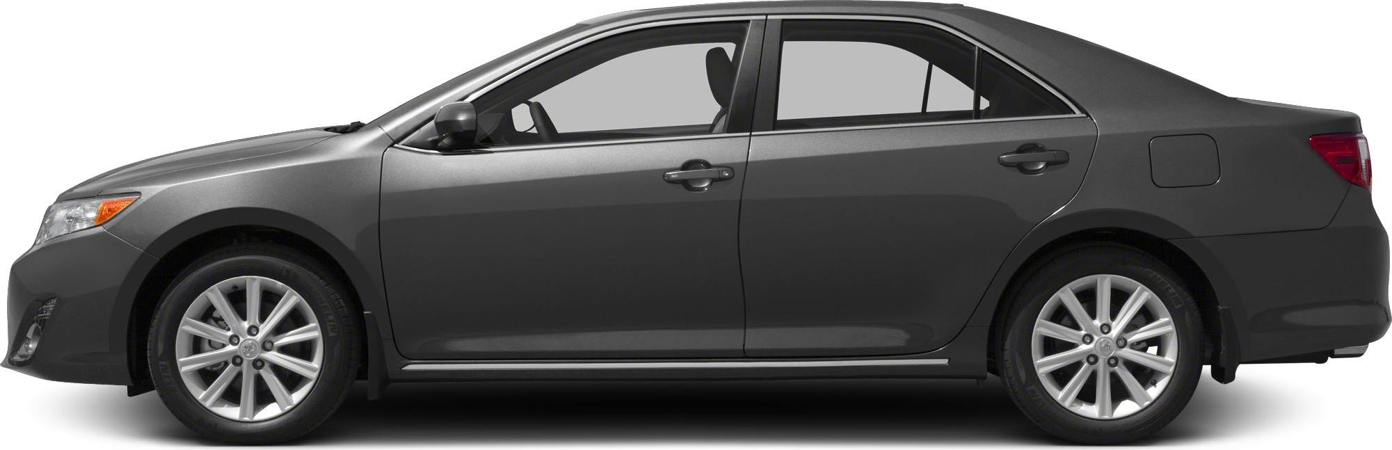 Side profile of mid-size sedan with aerodynamic shape and alloy wheels