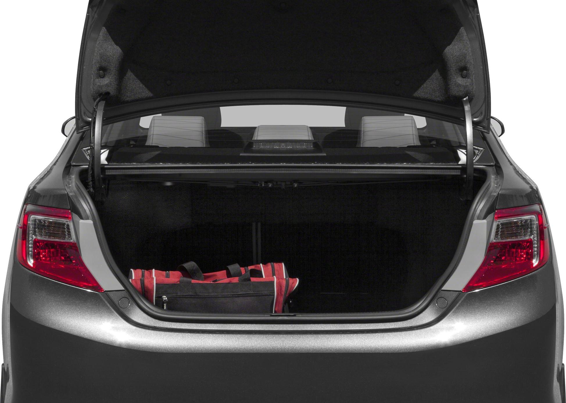 Open trunk with a red and black bag and rear taillights