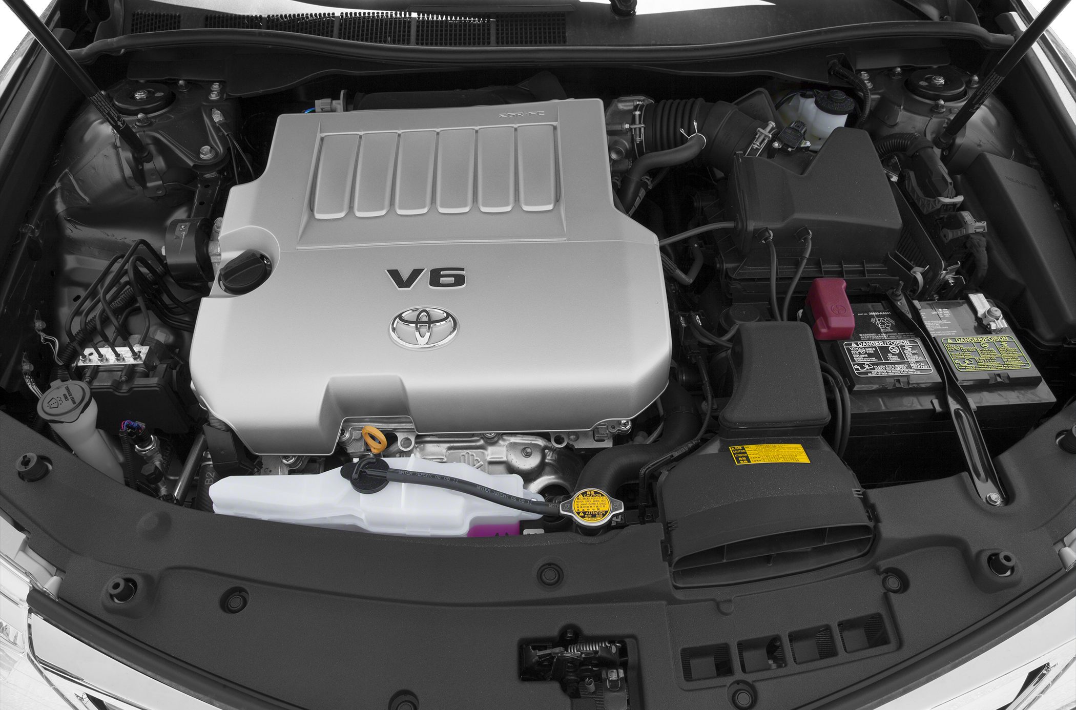 V6 engine compartment with Toyota emblem under hood