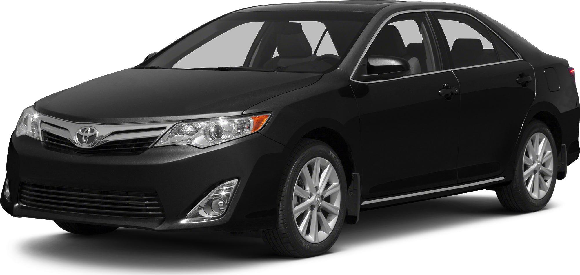 Black sedan with alloy wheels and chrome trim in front three-quarter view