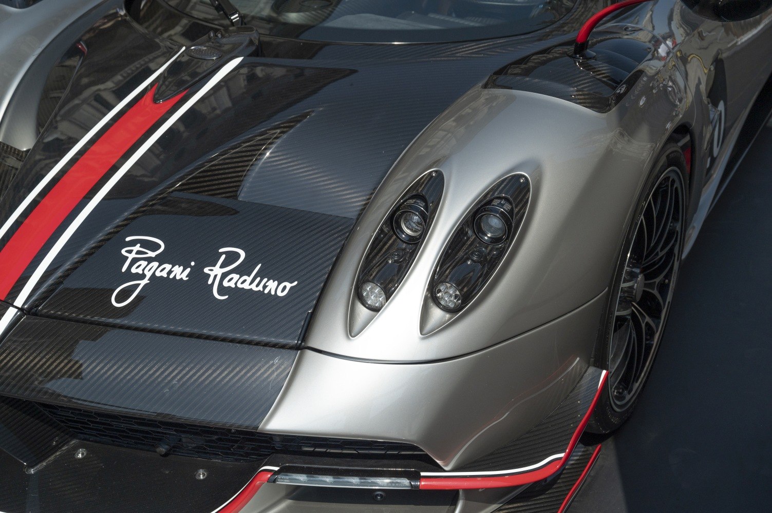 Carbon fiber hood with quad headlights and racing stripes