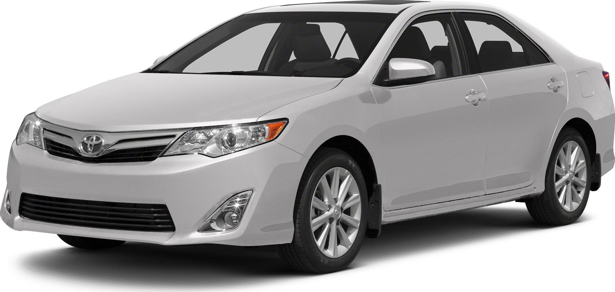 White mid-size sedan front side view with alloy wheels and sleek headlights