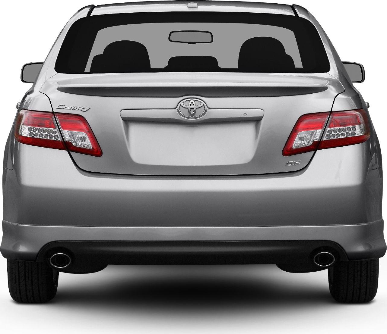 Rear view of a sedan with dual exhaust and distinctive taillights.
