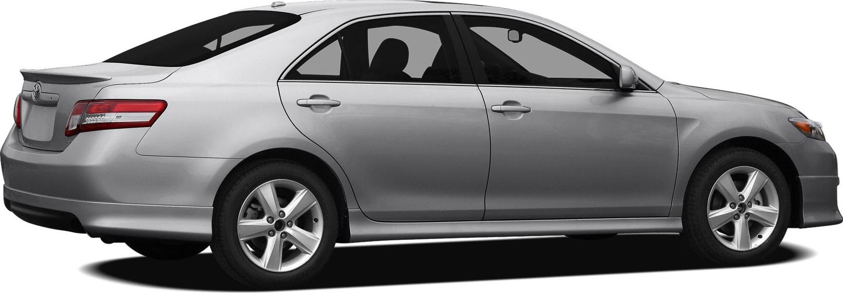 Silver sedan side view with alloy wheels and rear spoiler