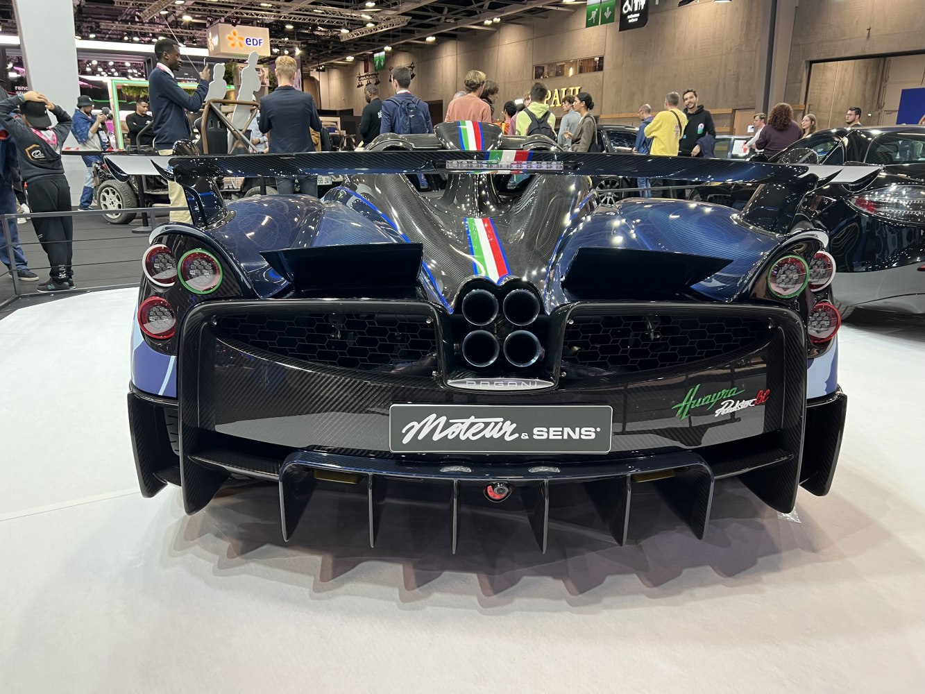 Rear with quad exhaust, aerodynamic carbon fiber spoiler and diffuser