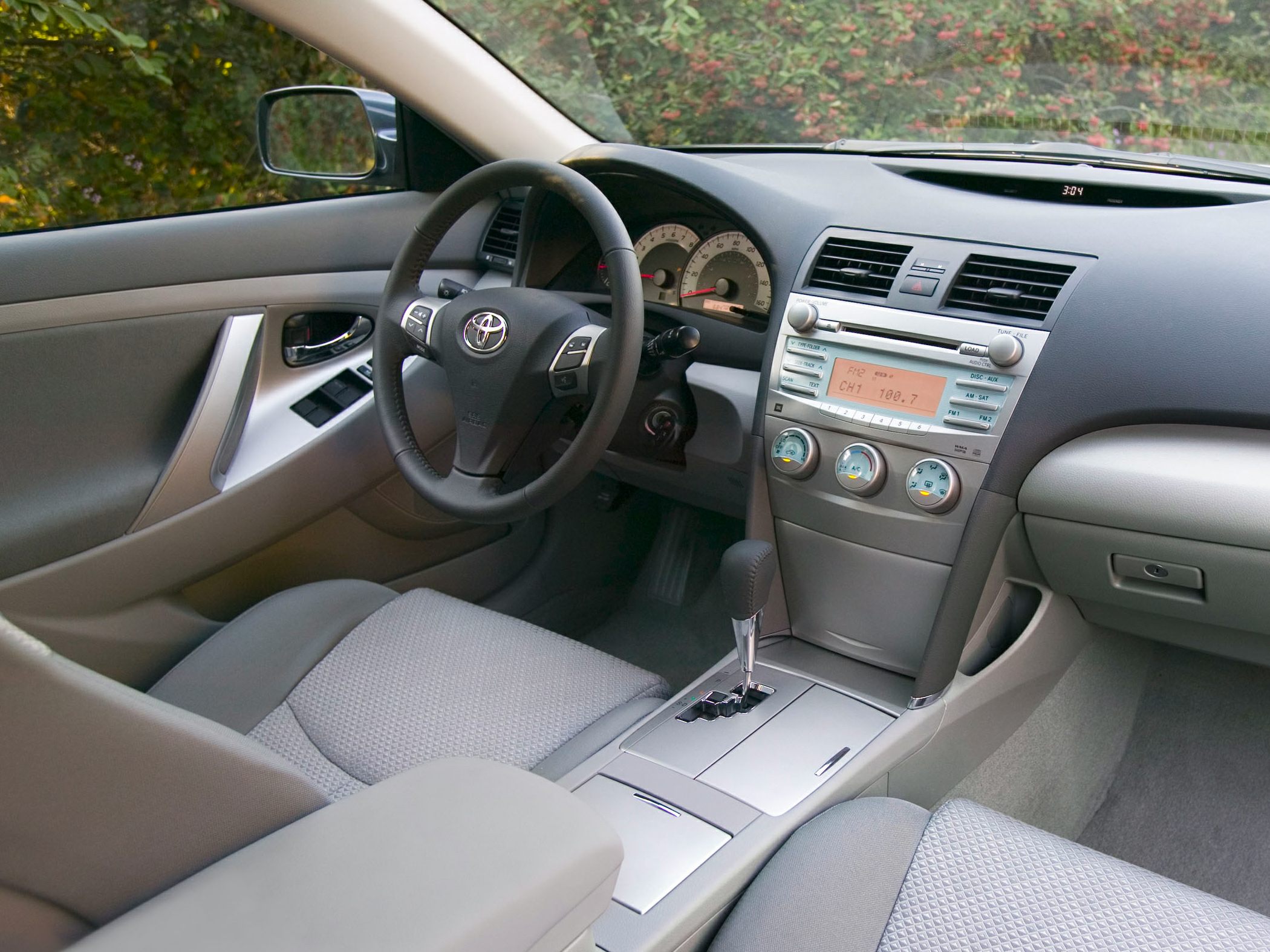 Dashboard, steering wheel, center console with radio and climate controls