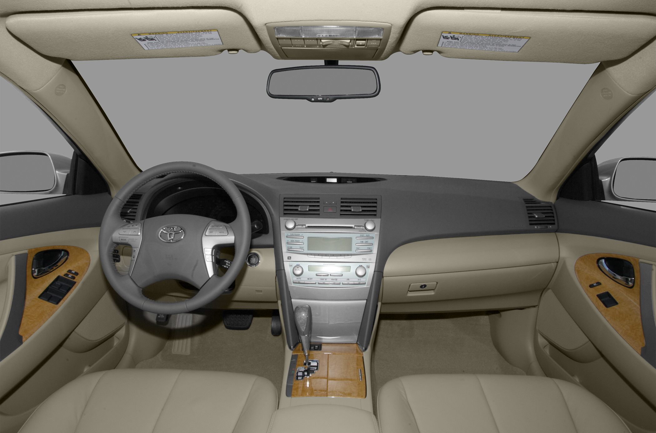 Dashboard, steering wheel, center console with wood accents