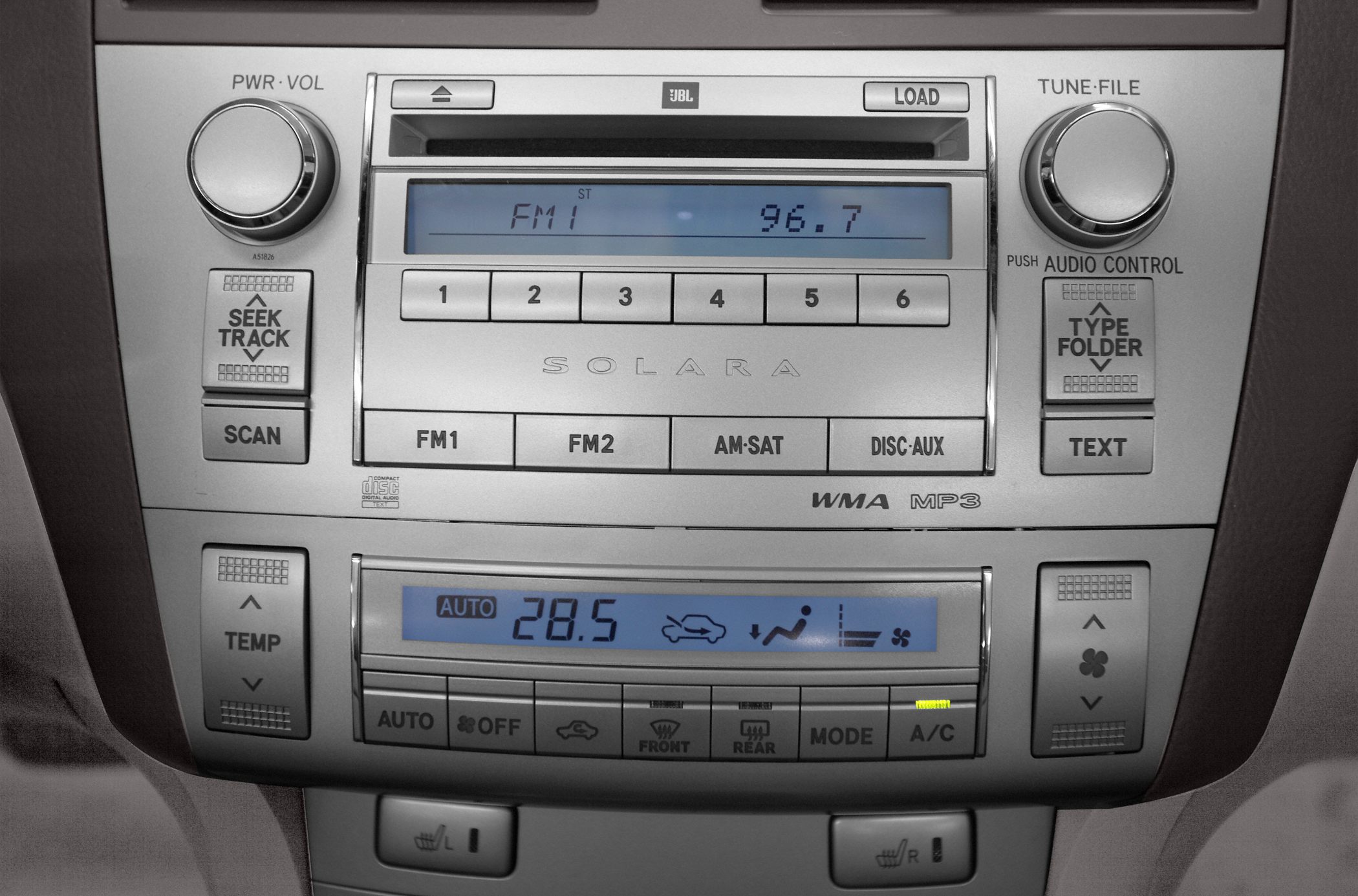 Audio system and climate control panel with digital displays and buttons