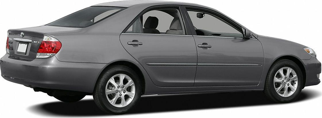 Rear side profile of a mid-size sedan with alloy wheels