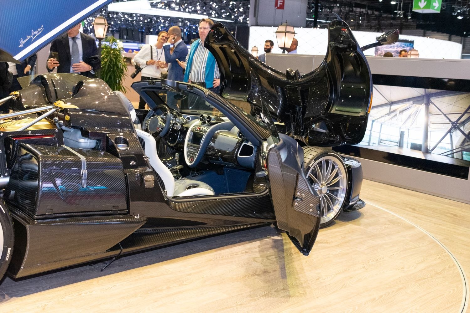 Carbon fiber body, gullwing door open, detailed interior and engine bay