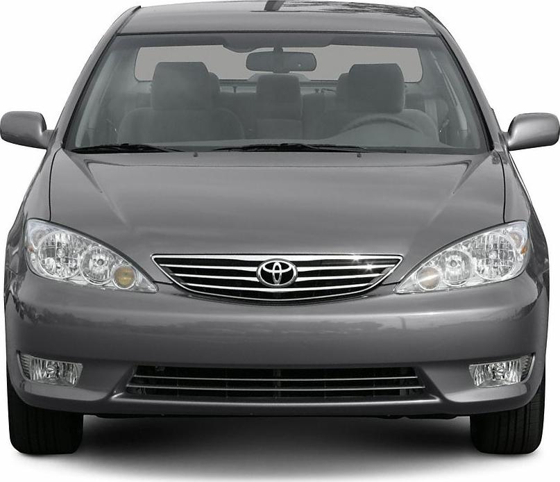 Front view of mid-2000s sedan with distinctive grille and headlights