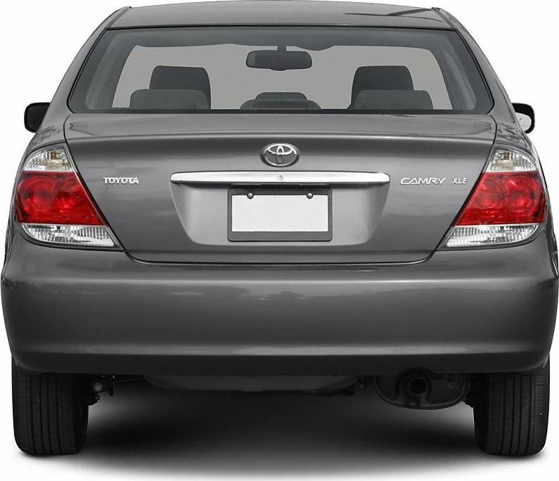 Rear view showing tail lights, trunk lid, and rear bumper of a sedan.