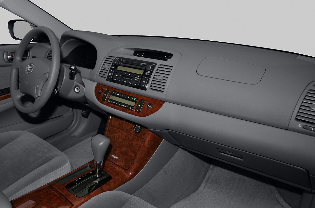 Dashboard and center console with wood trim and automatic gear shifter