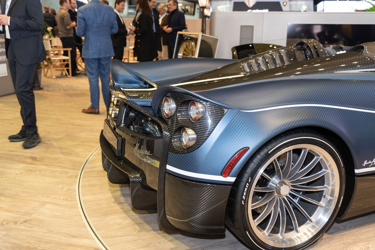 Carbon fiber rear design with unique taillights and alloy wheels