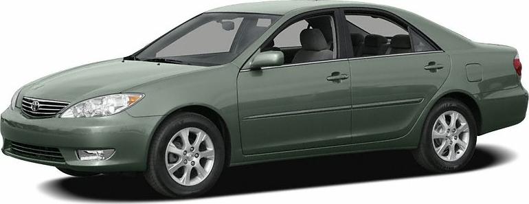 Side profile of mid-size four-door sedan with alloy wheels and aerodynamic design