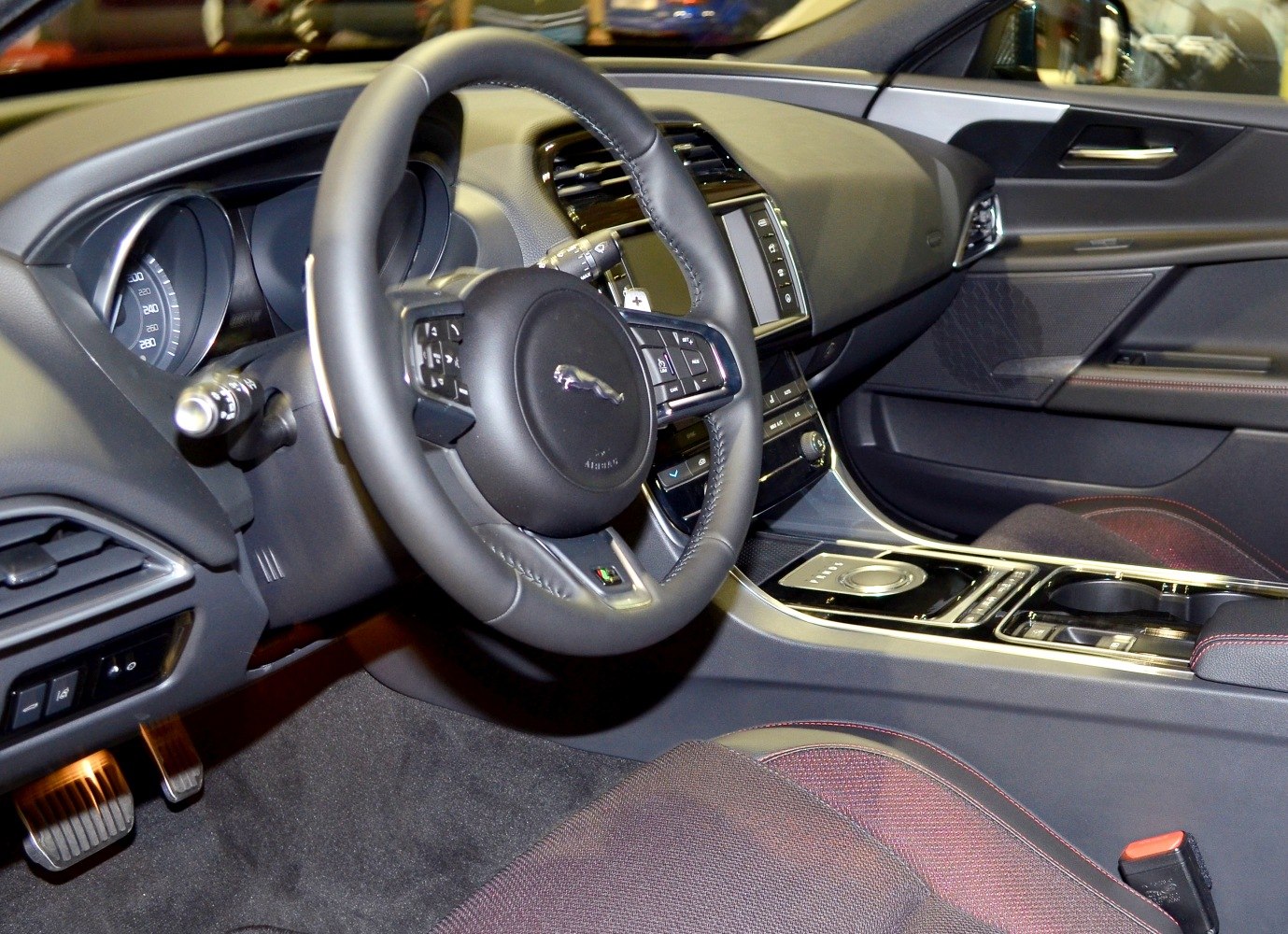 Steering wheel, dashboard, and center console of a modern vehicle interior