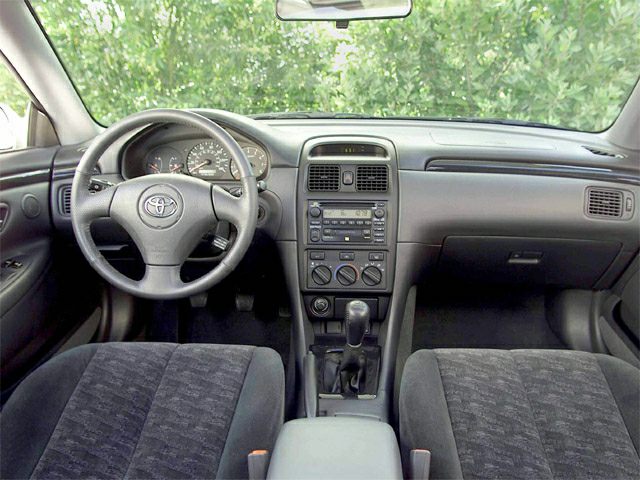 Dashboard and steering wheel with center console controls