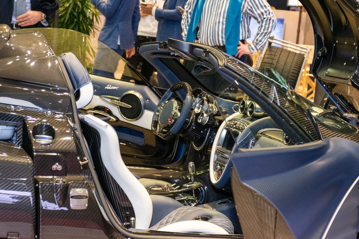 Interior featuring carbon fiber detailing and a unique dashboard design.