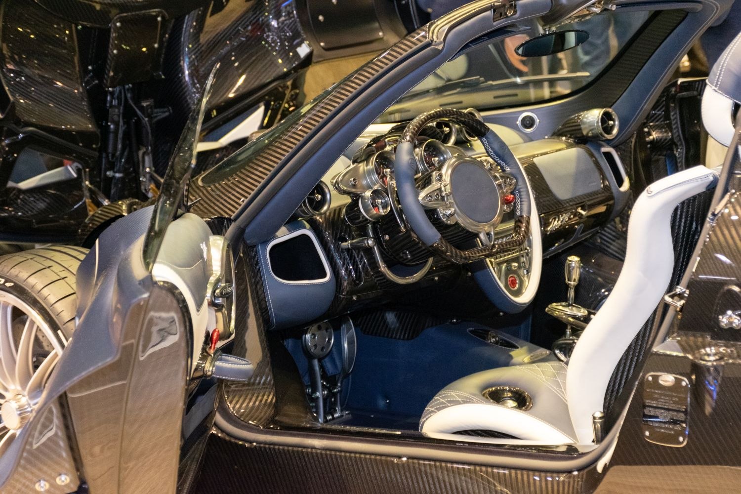 Carbon fiber dashboard and steering wheel in luxury convertible interior