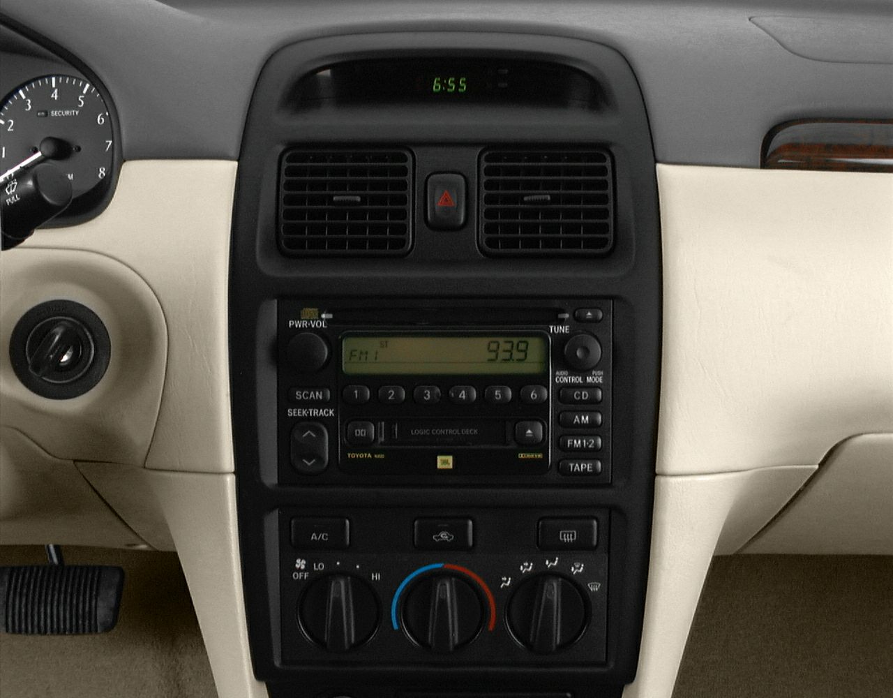 Classic center console with radio, cassette player, and climate controls