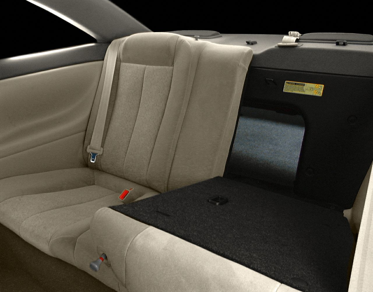 Rear beige seats with fold-down trunk access panel and seatbelt